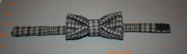 finished bow tie with velcro pieces added to the ends of the neck band