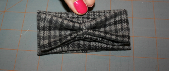 top piece is glued on an pinched to resemble the beginning shape of a bow tie